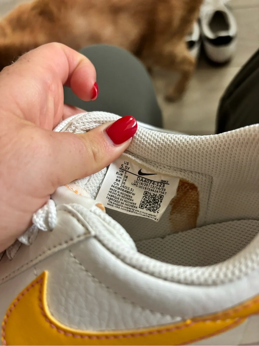 Nike White Sneakers with Yellow Swoosh